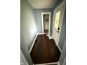 Inviting foyer featuring a coat closet and a decorative glass front door at 2124 W 64Th St, Indianapolis, IN 46260