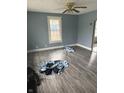 Bright living room with neutral paint and wood-look flooring at 2124 W 64Th St, Indianapolis, IN 46260