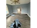 Spacious living room with neutral paint and wood-look flooring at 2124 W 64Th St, Indianapolis, IN 46260