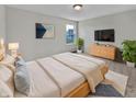 Calm and serene bedroom with soft lighting, a cozy bed, and stylish decor at 2859 Dursillas Dr, Plainfield, IN 46168