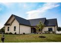 Well-maintained single-story home with beautiful landscaping and a classic design at 2932 Camden Ct, Greenwood, IN 46143