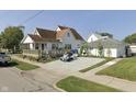 A charming home offering a spacious yard and a welcoming exterior at 535 Dunn Ave, Shelbyville, IN 46176