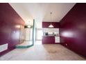 A wide-open living room features multiple doors and entrances to other areas of the house at 562 Monte Vista Dr, Greenwood, IN 46143
