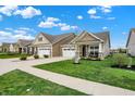 Well-manicured lawns enhance the curb appeal of these lovely single-Gathering homes in this charming neighborhood at 6026 Rockdell Dr, Indianapolis, IN 46237
