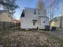 Backyard features a compact yard and convenient access to a rear entrance of the home at 614 E 5Th St, Anderson, IN 46012