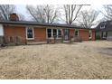 Charming single-story brick home with a covered porch and newly installed roof at 1760 Market St, Martinsville, IN 46151
