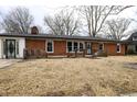 Charming single-story brick home with a covered porch and newly installed roof at 1760 Market St, Martinsville, IN 46151