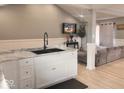 Modern kitchen featuring marble countertops, sleek black fixtures, and an open concept design at 2517 Horton Dr, Anderson, IN 46011