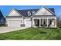 Inviting single-Gathering home with manicured lawn, three car garage, and covered entryway at 2779 Ruffian Dr, Westfield, IN 46074