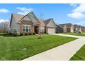 Attractive home with a well-maintained lawn, a two-car garage, and a neat row of neighboring houses at 3971 Albert Ln, Bargersville, IN 46106