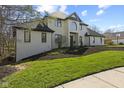 Exterior shot showcasing the home's architecture, landscaping, and curb appeal at 4312 S Woodbridge Ln, New Palestine, IN 46163