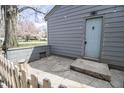 Comfortable back porch with a privacy fence, perfect for relaxing and enjoying the outdoors at 4342 Lasalle St, Indianapolis, IN 46205