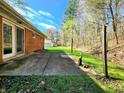 The concrete patio area offers a secluded outdoor space and backyard views at 7132 N Stafford Ln, Martinsville, IN 46151