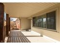 Inviting covered porch area with wood columns and view of the front yard at 7260 Marla Dr, Indianapolis, IN 46256