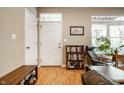 Inviting entryway with natural light and wood laminate flooring at 2316 N Pennsylvania St # 1, Indianapolis, IN 46205
