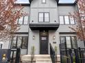 Attractive gray townhome with black accents and manicured landscaping at 1326 E 10Th St, Indianapolis, IN 46202
