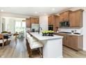 Kitchen featuring stainless steel appliances, an island with breakfast bar, and open layout at 261 Onset Way, Westfield, IN 46074