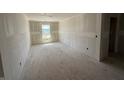 A bedroom with drywall and a window at 3309 Godby Dr, Sheridan, IN 46069
