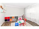 Inviting playroom with colorful storage, a play table, and bright, natural light at 3650 Tipperlin Rd, Bargersville, IN 46106