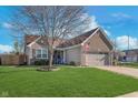 Lovely home featuring a well-kept lawn and neutral siding, perfect for suburban living at 4280 Zachary Ln, Westfield, IN 46062