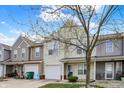Attractive home featuring a front yard with healthy shrubbery and a one car garage at 503 Fayette Dr, Westfield, IN 46074