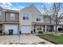 Inviting home with attached garage and green lawn at 503 Fayette Dr, Westfield, IN 46074