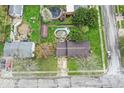 Aerial view of the property showing the roof, yard, and above-ground swimming pool at 6853 Cordova Dr, Indianapolis, IN 46221