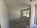 A versatile room bathed in light from a window, ready for your personal touch at 24517 Wallace St, Sheridan, IN 46069