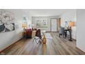 Inviting living room showcasing hardwood floors, natural light, and contemporary decor at 6742 S New Jersey St, Indianapolis, IN 46227