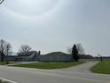 Charming exterior featuring stone accents and a large yard in a serene, country setting at 4902 N 700 W, McCordsville, IN 46055