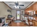Bright kitchen featuring a breakfast bar, stainless steel appliances, and view of the backyard at 4930 Founders Ct, Anderson, IN 46017