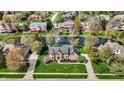 Aerial view of stately home with pond in a desirable neighborhood at 4932 Willow Ridge Ct, Zionsville, IN 46077