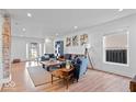 Bright and airy living room with hardwood floors and stylish furnishings at 549 Keystone Ave, Indianapolis, IN 46201