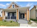 Charming two-story home with covered front porch has stylish design details at 1321 Union St, Indianapolis, IN 46225