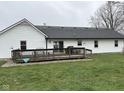 Large deck for outdoor dining and entertaining overlooks a spacious backyard at 13440 E 166Th St, Noblesville, IN 46060