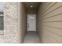 Close-up of the front door featuring decorative glass and stylish hardware at 2144 Connie Ct, Franklin, IN 46131