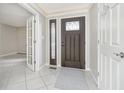 Inviting foyer with tile flooring, leading to a bright and open living space at 2305 Van Ness Pl, Indianapolis, IN 46240