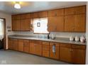 Traditional kitchen with ample cabinet space and countertop at 249 N 15Th Ave, Beech Grove, IN 46107