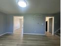 Open-concept living area featuring new floors and ample natural light at 3413 Ivory Way, Indianapolis, IN 46227