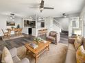 Inviting open-concept living area with modern decor, breakfast bar, and seamless flow at 4630 Kelvington Dr, Indianapolis, IN 46254