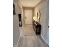 Stylish entryway boasts modern decor and neutral tones, leading into the home at 796 Booneway Ln, Bargersville, IN 46106