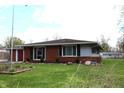 Single story brick home with well maintained yard and landscape at 1255 Easy St, Greenwood, IN 46142