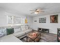 Bright living room with neutral tones, a comfortable sectional sofa, and stylish decor at 2221 Groff Ave, Indianapolis, IN 46222