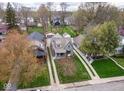 An aerial view of the property and surrounding neighborhood showing the house's location and neighborhood at 5654 Broadway St, Indianapolis, IN 46220