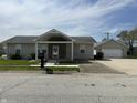 Inviting home with detached garage and well-maintained lawn at 600 Fairlane Dr, Edinburgh, IN 46124