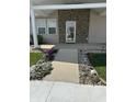 Close up on the entrance with a well-lit walkway leading to the front door at 600 Fairlane Dr, Edinburgh, IN 46124