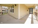 Covered front porch featuring decorative railings, spacious layout, and natural light at 2209 Carrollton Ave, Indianapolis, IN 46205