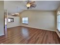 Bright living room boasts hardwood floors and ample space for entertaining guests at 2606 Bristlecone Dr, Indianapolis, IN 46217