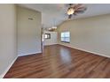 Spacious living room featuring beautiful hardwood floors and a ceiling fan at 2606 Bristlecone Dr, Indianapolis, IN 46217