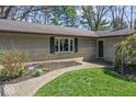 Inviting front entrance with brick walkway and manicured landscaping at 10129 Guilford Ave, Carmel, IN 46280